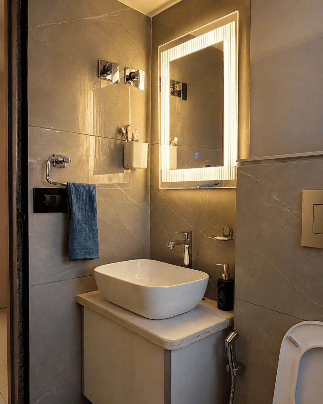 Bathroom vessel sink with backlit mirror